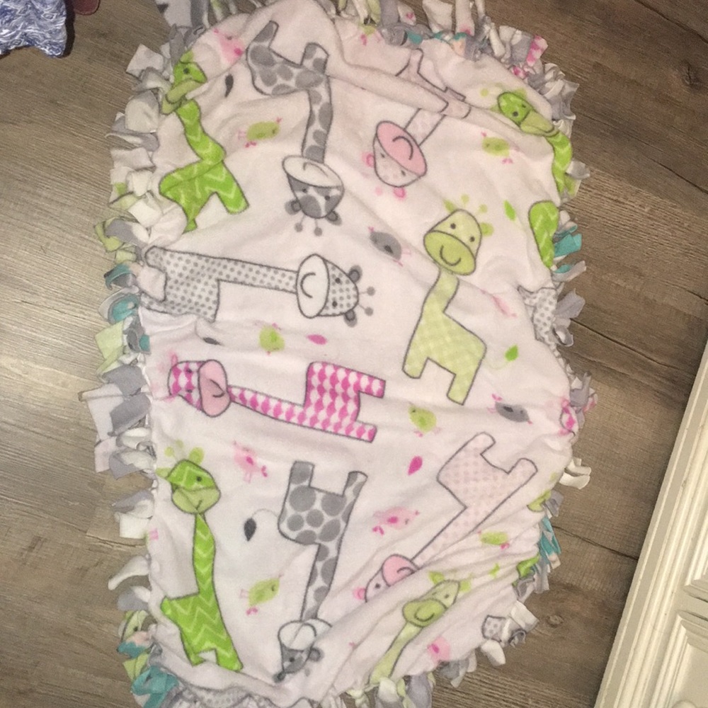 Lovely fleece hand-tied reversible oval blanket